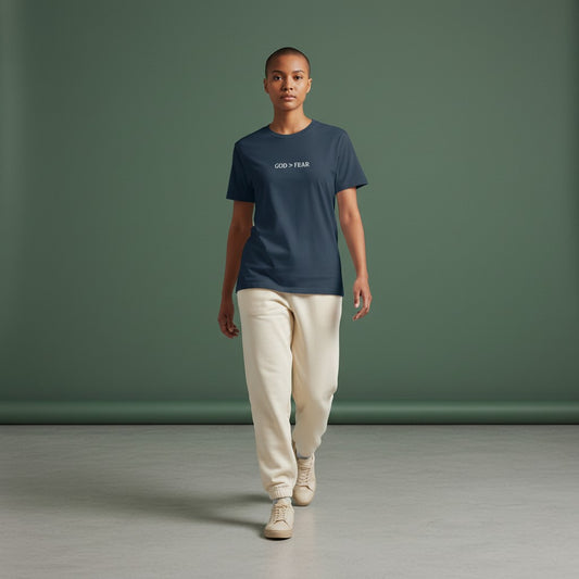 Omina Studio navy blue 100% cotton crew neck t-shirt with "GOD > FEAR" graphic. Slim fit, cropped silhouette.