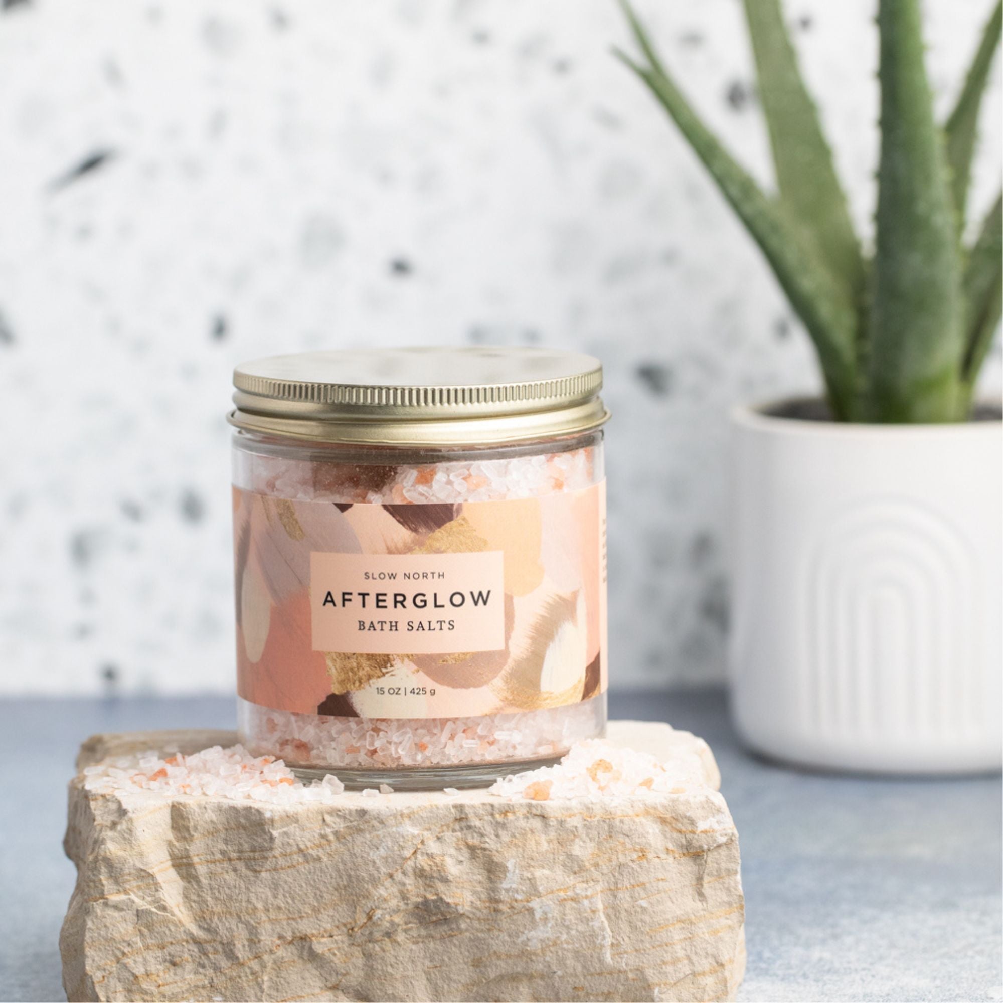 Slow North Afterglow Bath Salts in 15 oz jar, featuring natural body care products with soothing mineral-rich salts.