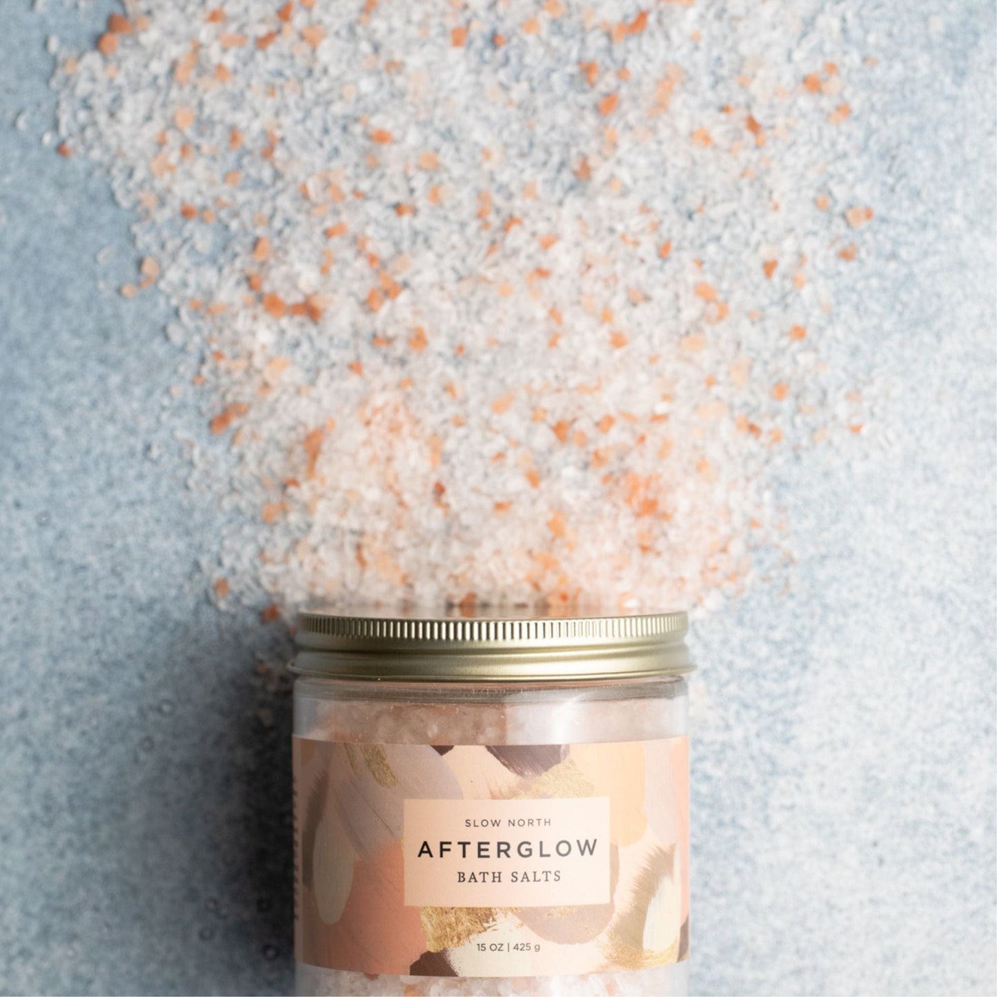 Slow North Afterglow Bath Salts in a 15 oz jar, showcasing relaxing body care with natural mineral-rich salts.
