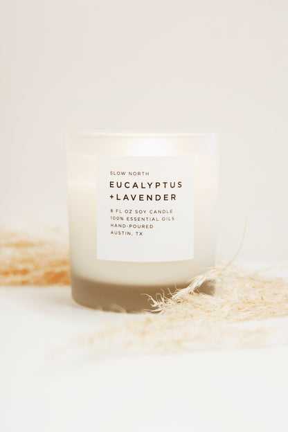 Frosted soy candle with eucalyptus and lavender scent by Slow North, 8oz size, featuring a frosted glass container.