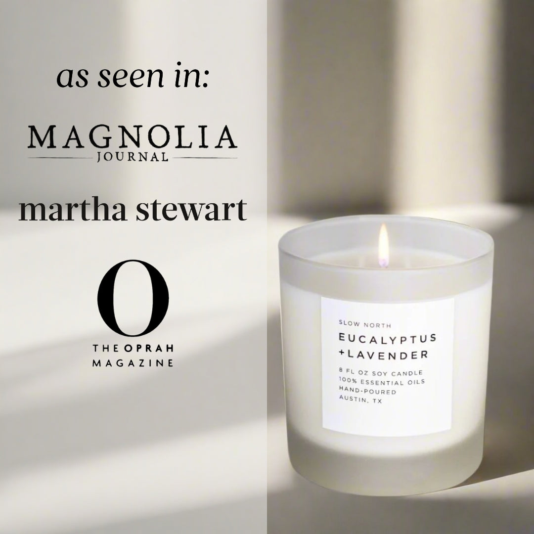Frosted candle by Slow North with eucalyptus and lavender scent, featuring a minimalist glass container and natural botanical decor.
