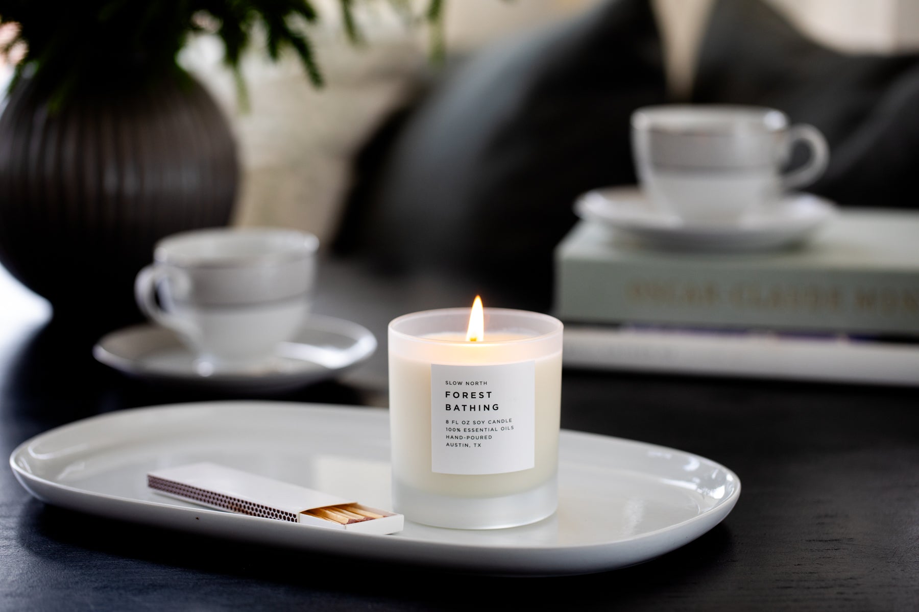 Frosted Forest Bathing Signature Candle by Slow North with fir, pine, and patchouli scent, featuring a frosted glass design.