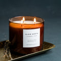 Slow North Lavender + Cedar Signature 3-Wick Candle showing three wicks and lavender and cedar scent accents.