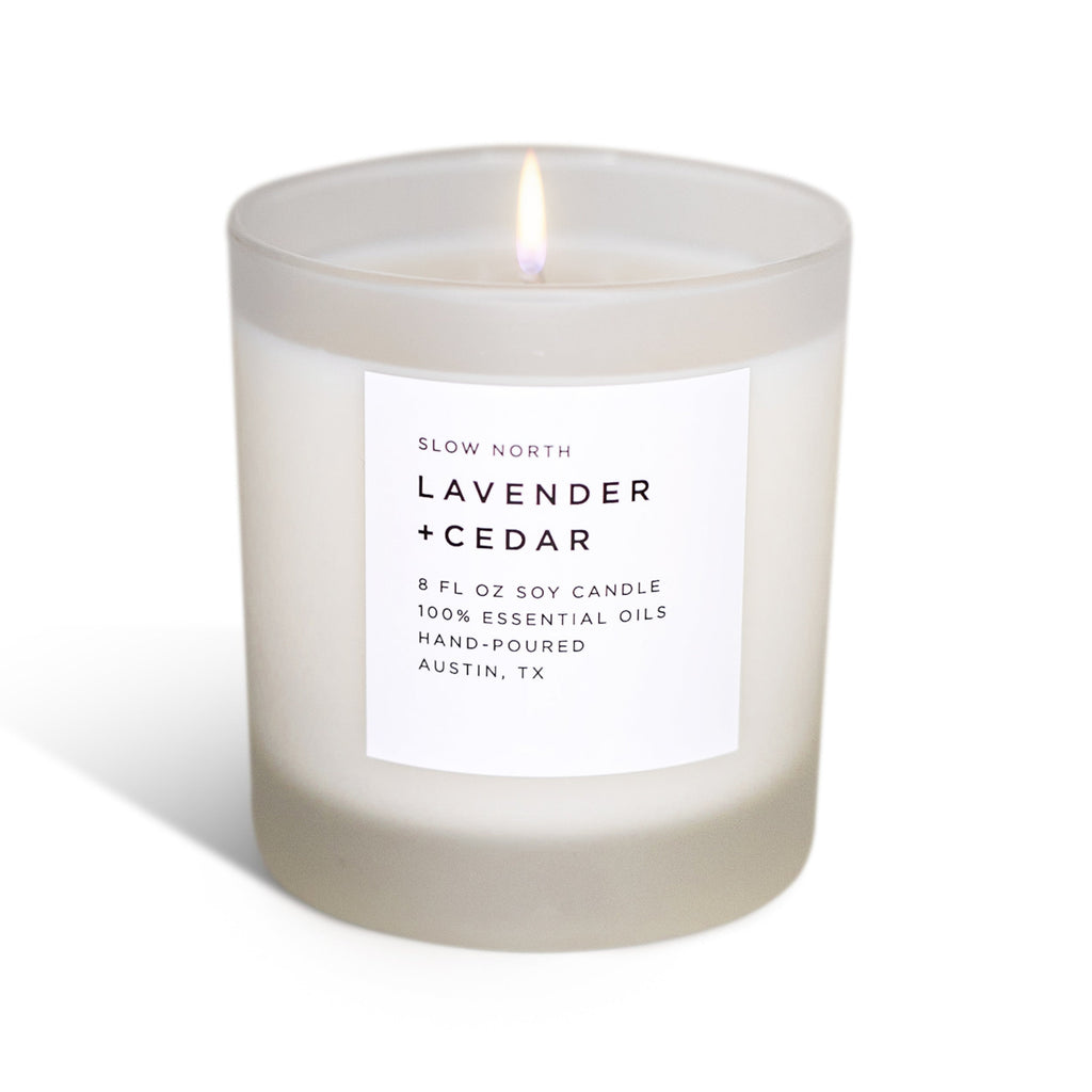 Frosted lavender and cedar scented candle by Slow North, showcasing the non-toxic Signature Candle in a frosted glass container.