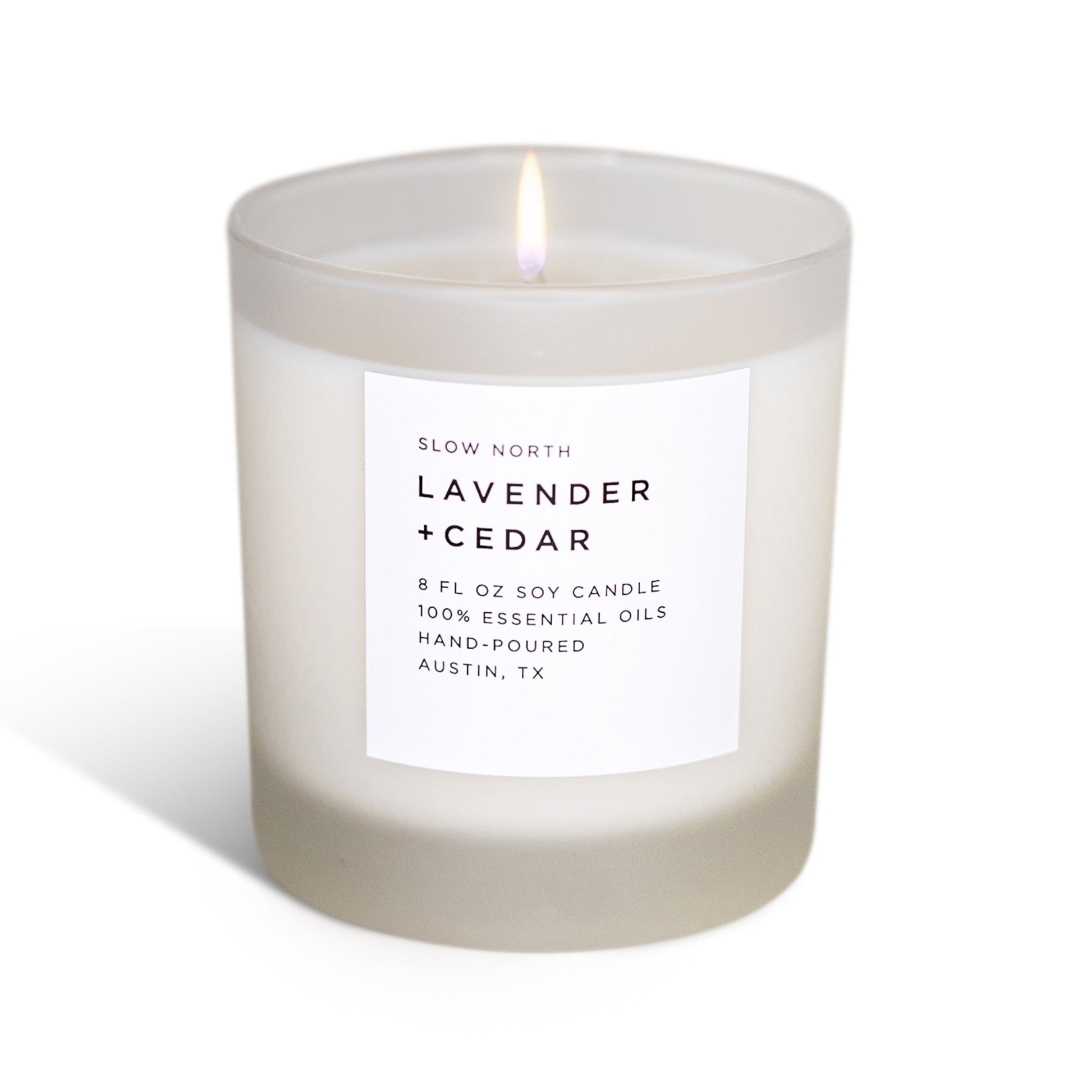 Frosted lavender and cedar scented candle by Slow North, showcasing the non-toxic Signature Candle in a frosted glass container.