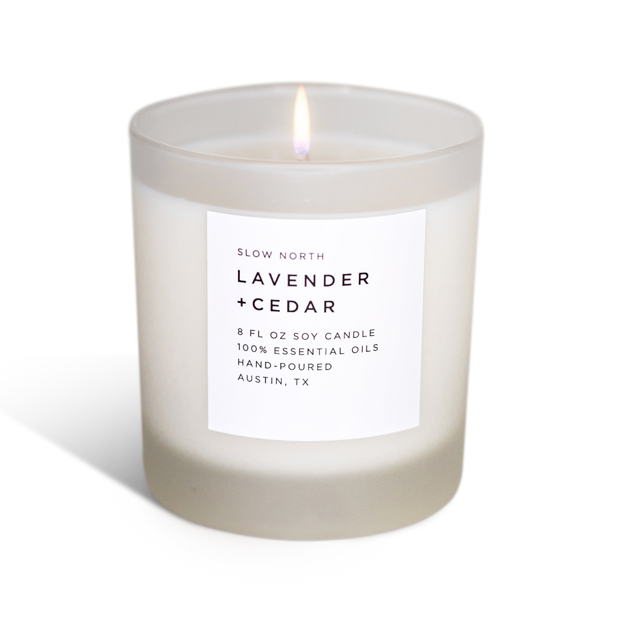 Frosted lavender and cedar scented candle by Slow North, showcasing the non-toxic Signature Candle in a frosted glass container.