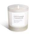Frosted candle by Slow North with lemongrass and tangerine scent, showcasing a minimalist frosted glass holder.