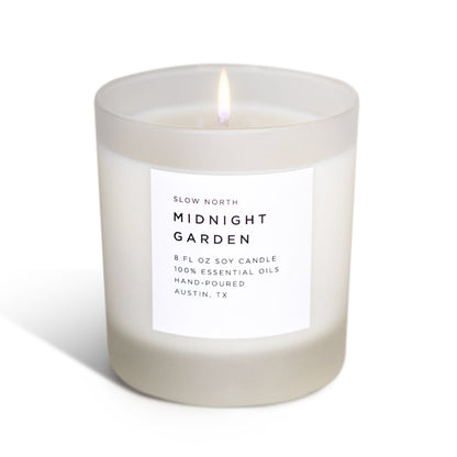 Frosted Midnight Garden soy candle by Slow North featuring lavender, rosemary, and geranium for a calming, natural ambiance.