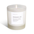Frosted candle from Slow North's Shangri-La Signature collection with eucalyptus, lavender, and lemongrass scent.