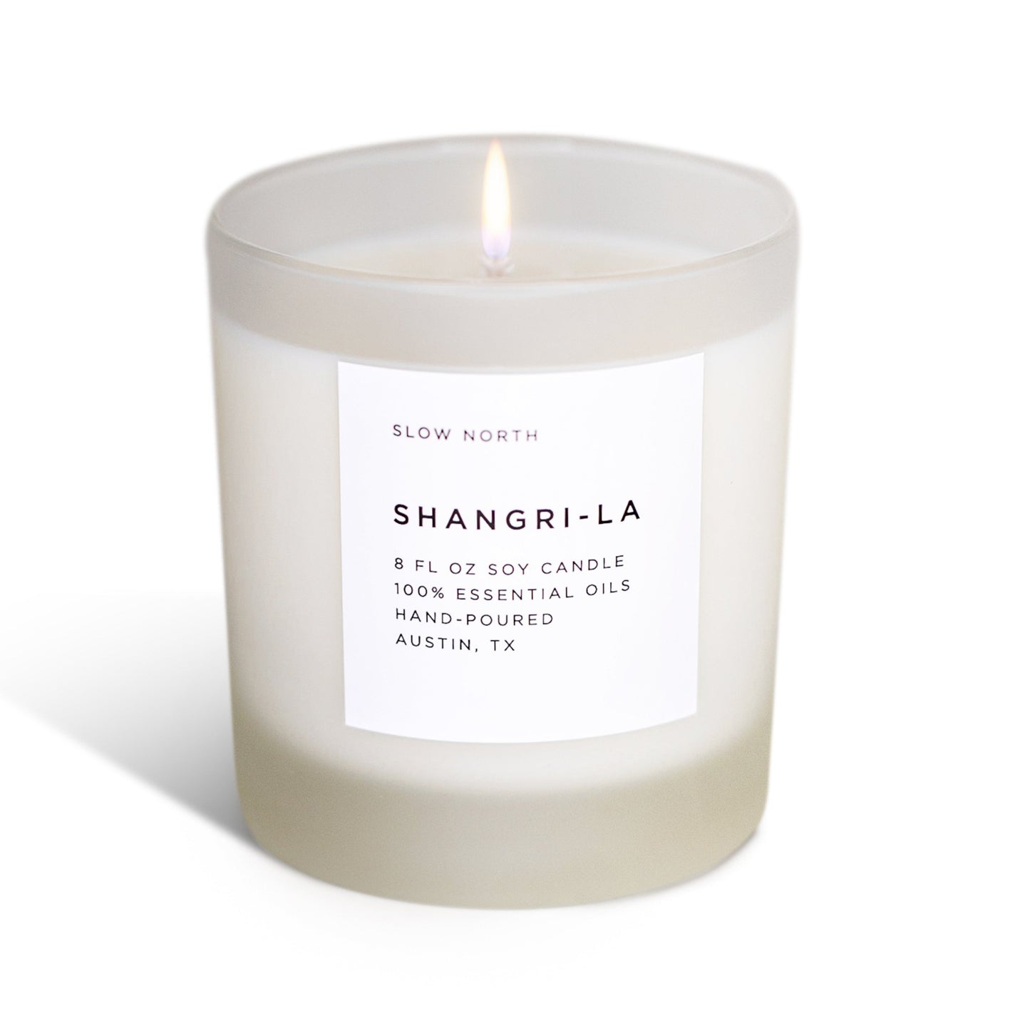 Frosted candle from Slow North's Shangri-La Signature collection with eucalyptus, lavender, and lemongrass scent.