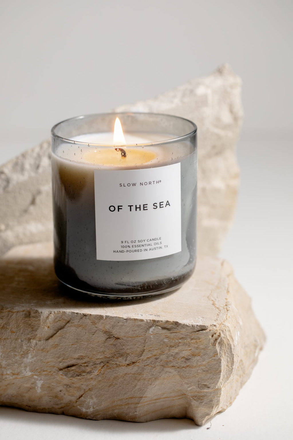 Slow North Of The Sea Spa Collection Candle with a sleek glass jar and ocean-inspired design, perfect for relaxing spa ambiance.