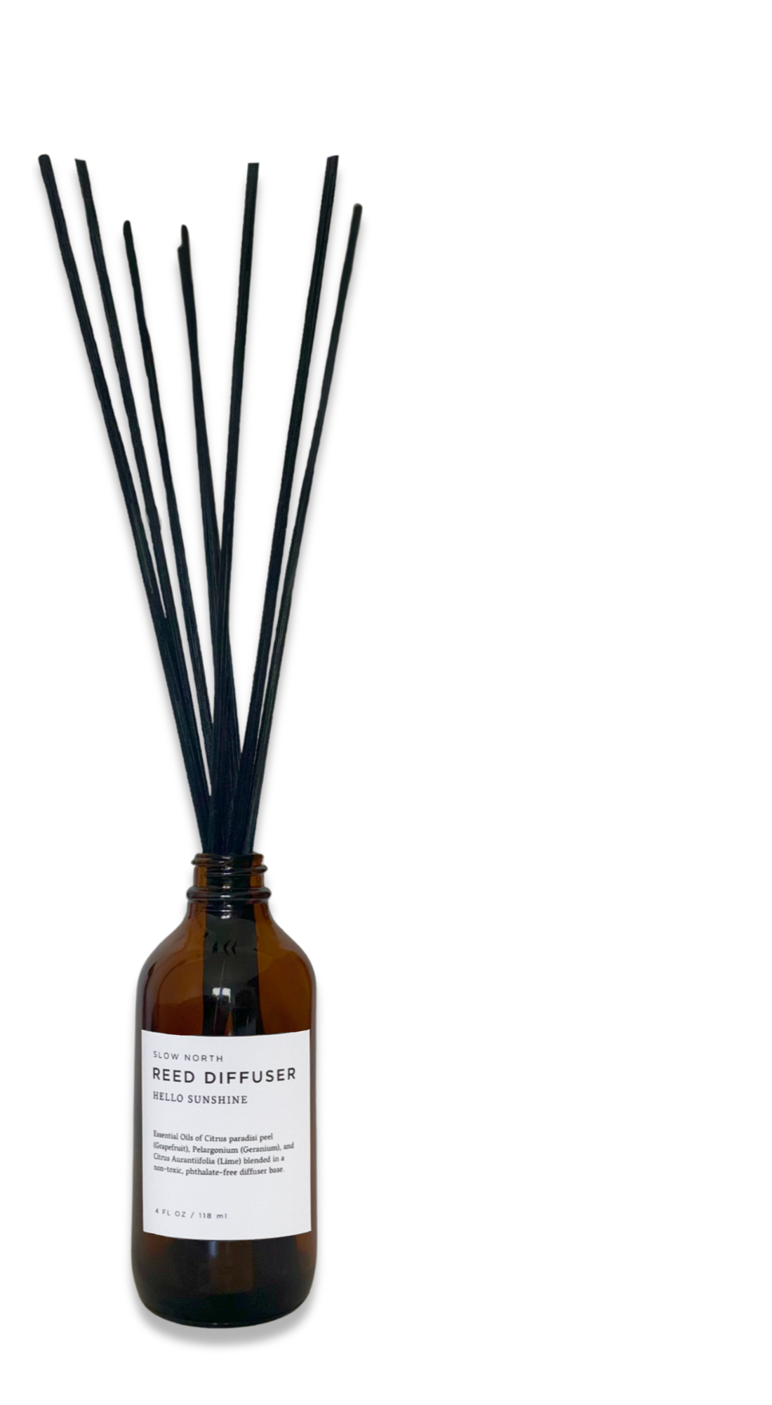 Slow North Hello Sunshine reed diffuser with elegant glass bottle and natural reed sticks for fresh, citrusy home fragrance.