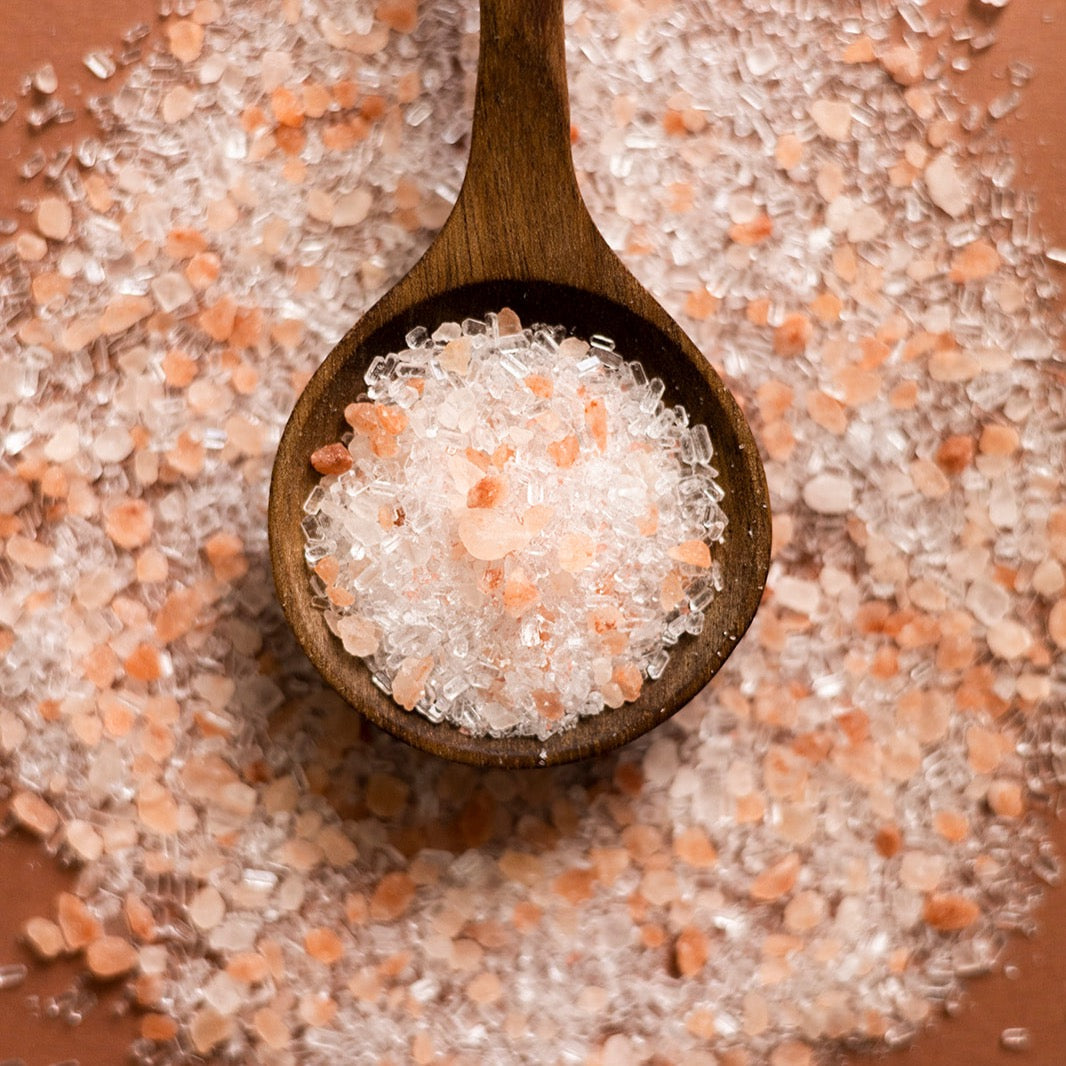 Slow North Afterglow Bath Salts in a 15 oz jar, with vibrant pink and orange salts visible, ideal for relaxing body care.