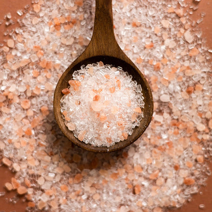 Slow North Afterglow Bath Salts in a 15 oz jar, with vibrant pink and orange salts visible, ideal for relaxing body care.