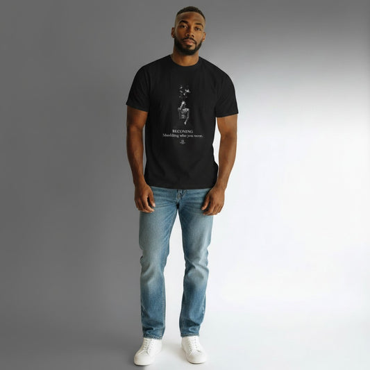 Model wearing a black Omina cotton graphic t-shirt with a stardust figure print and Becoming inspirational text.