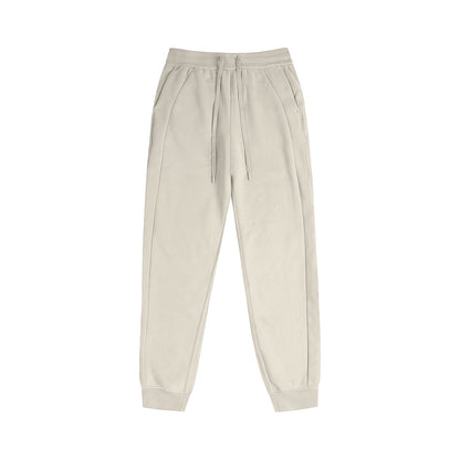 Omina Essentials women's beige mid-waist jogger pants with a drawstring waist and ribbed cuffs in thick cotton blend