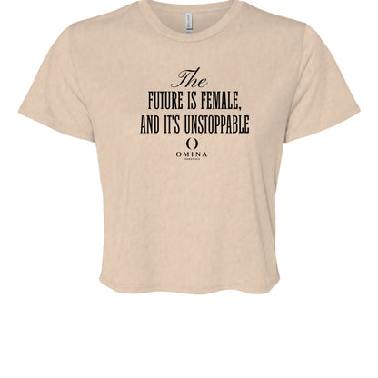 Omina beige cropped tee with black text reading The Future Is Female and It's Unstoppable in a soft flowy fabric.