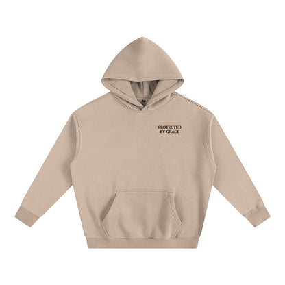 Omina beige oversized fleeced hoodie with Protected By Grace text on the chest and a drop shoulder silhouette.
