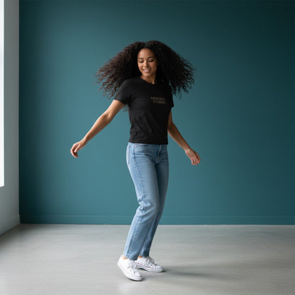 Omina black cotton-spandex blend crewneck t-shirt with "OMINA STUDIO" logo printed on chest. Bodycon fit.