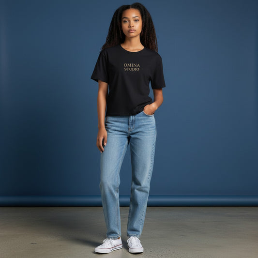 Omina black cotton-spandex blend crewneck t-shirt with "OMINA STUDIO" printed on chest. Bodycon fit.