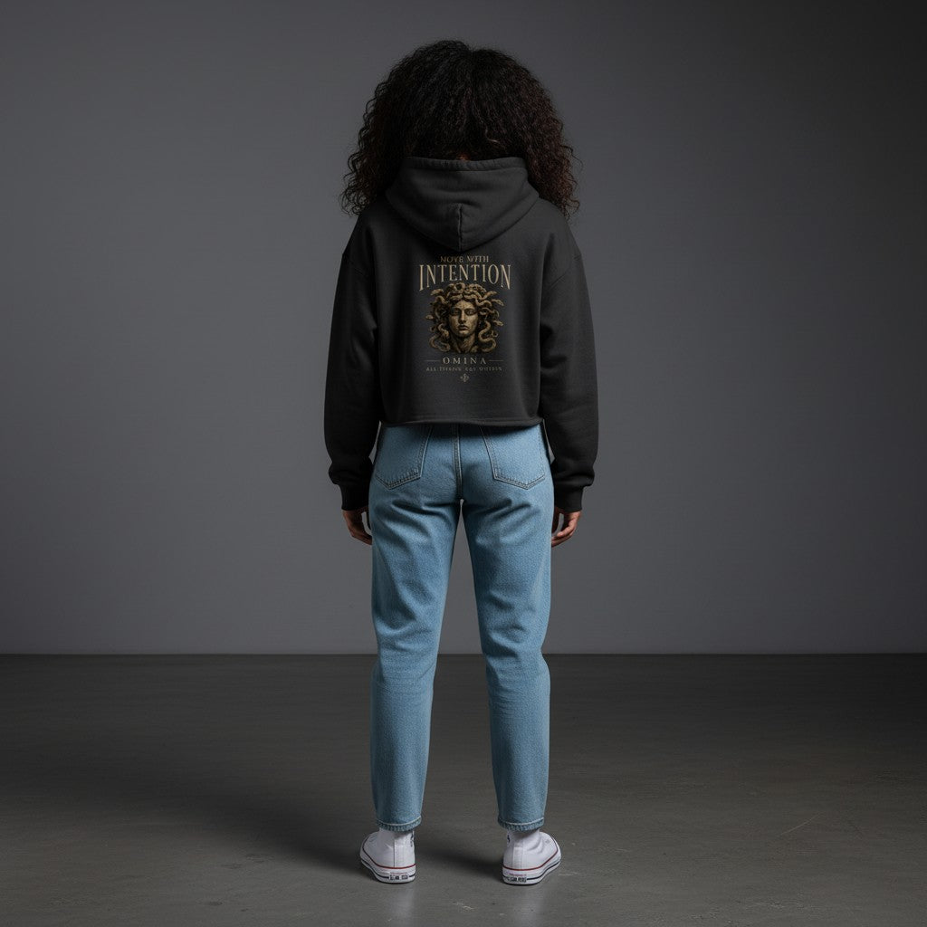 Omina black heavyweight cotton-blend cropped zip hoodie with "Move With Intention" graphic and Medusa illustration.