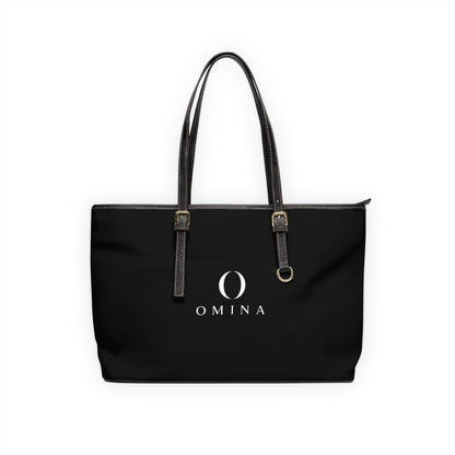 Omina black PU leather shoulder tote bag with gold hardware, adjustable straps, and centered white logo.