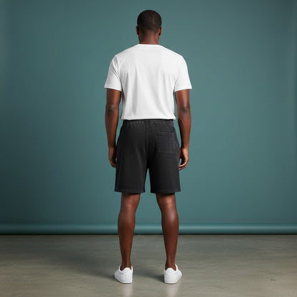 Omina black mineral wash waffle knit shorts with elastic waistband and single back pocket.