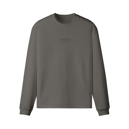 Omina charcoal grey heavyweight long sleeve t-shirt with crew neck, drop shoulders, and minimalist chest logo.