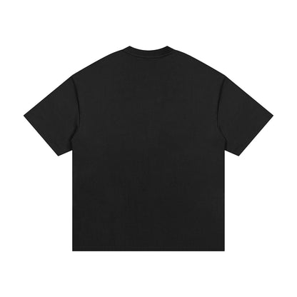 Omina Essentials black heavyweight cotton t-shirt with relaxed oversized fit and drop shoulders.