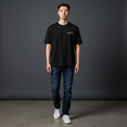 OMINA ESSENTIALS black heavyweight cotton t-shirt with oversized fit and drop shoulders. Minimal logo on chest.