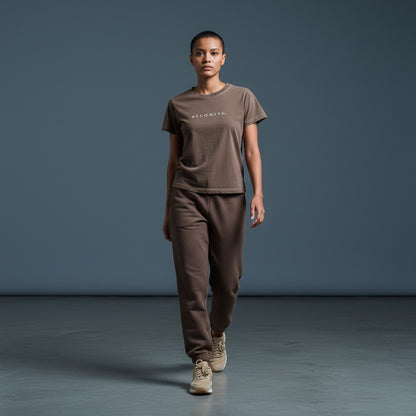 OMINA Essentials brown cotton slim fit t-shirt with "BECOMING." text in white.