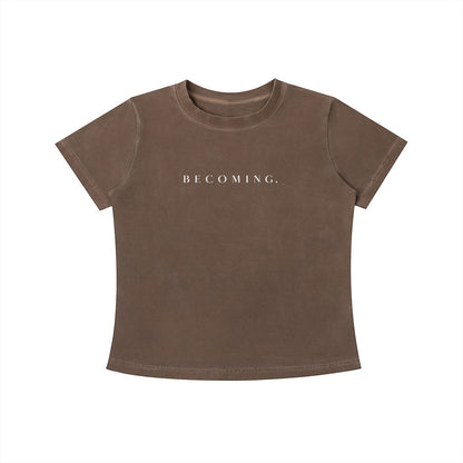 OMINA Essentials brown cotton slim fit t-shirt with "BECOMING." printed on chest. Vintage wash.