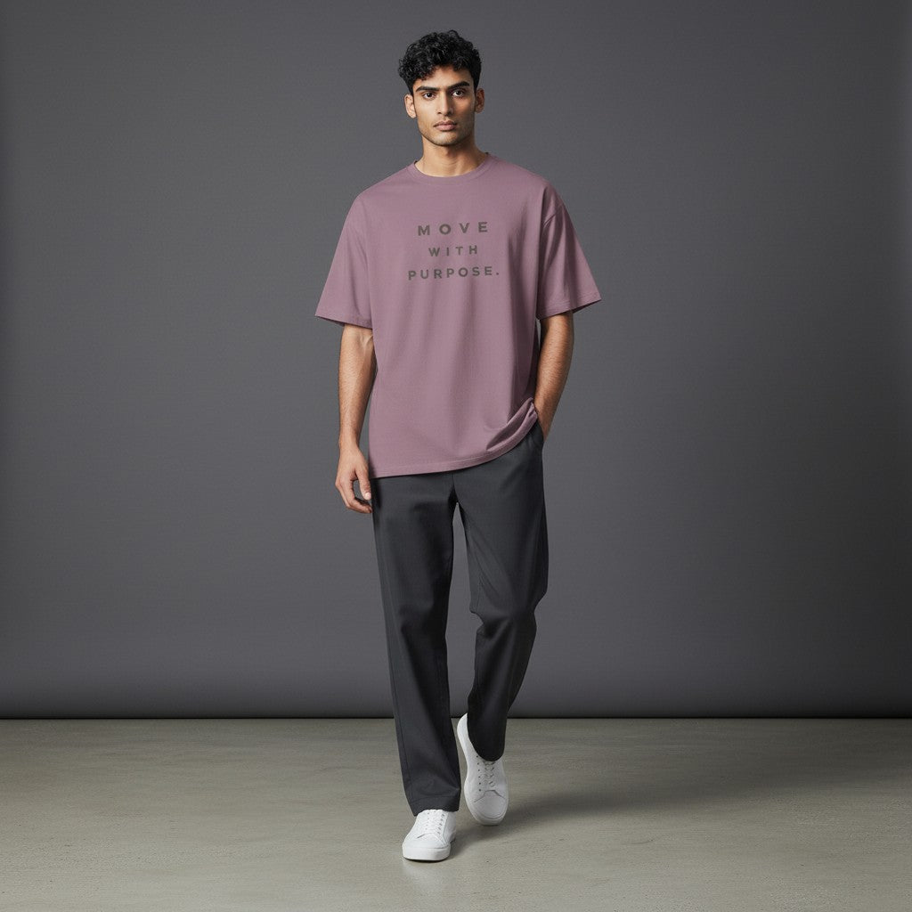 Omina Essentials mauve heavyweight cotton t-shirt with "MOVE WITH PURPOSE." graphic text on chest. Relaxed fit, crew neck.