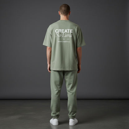 OMINA Essentials No Limit heavyweight cotton t-shirt in sage green with a relaxed fit and crew neck.