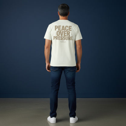Omina Essentials cream heavyweight cotton t-shirt with large taupe 'PEACE OVER PRESSURE' graphic and logo.