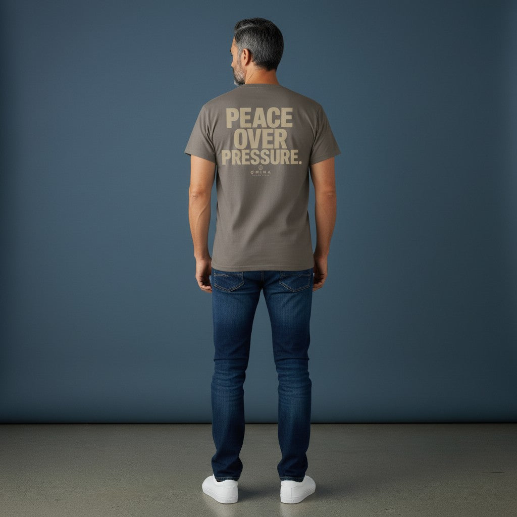 Omina Essentials grey heavyweight cotton t-shirt with "PEACE OVER PRESSURE" graphic and logo on back.