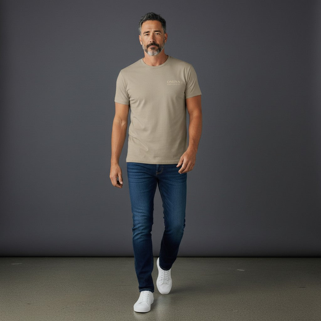 Omina Essentials tan heavyweight cotton t-shirt with small embroidered logo on chest. Relaxed oversized fit.
