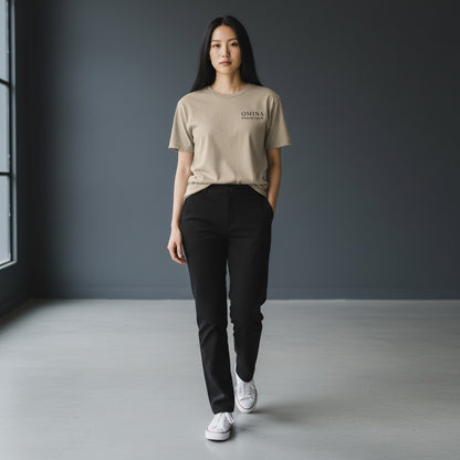 Omina Essentials women's soft taupe short-sleeve tee with minimalist logo on left chest.