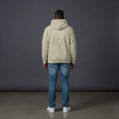 Omina Studio beige heavyweight cotton pullover hoodie with "Quiet Confidence. Built With Intention. Led By Faith." text and a cross graphic.