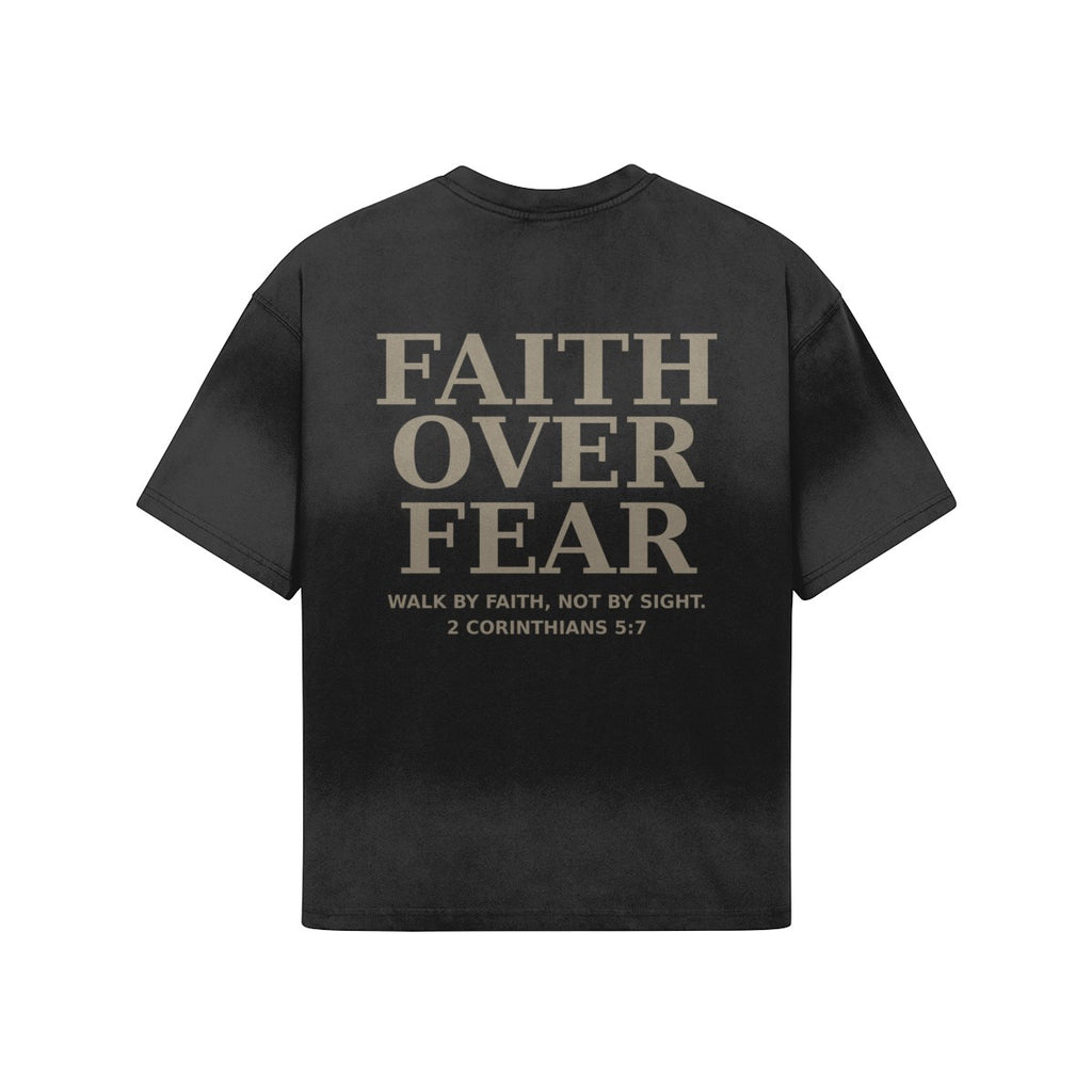 OMINA Studio black heavyweight cotton t-shirt with "FAITH OVER FEAR" graphic and Bible verse 2 Corinthians 5:7.