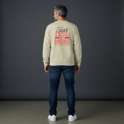 Man wearing Omina beige heavyweight cotton long sleeve shirt with Fear Less Do More graphic print on the back.