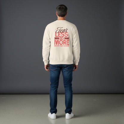 Man wearing Omina cream long sleeve shirt with Fear Less Do More graphic print on back, paired with blue jeans.