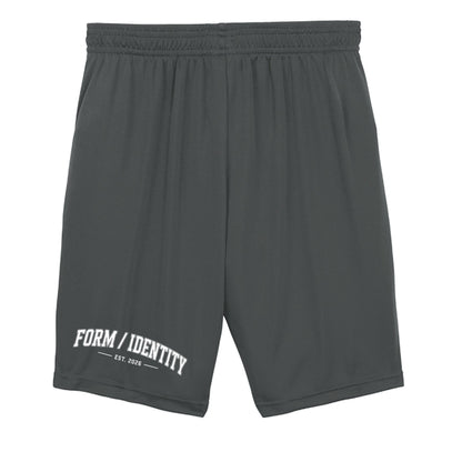Omina Kids Youth Form / Identity shorts in dark grey with an elastic waistband and white text graphic on the left leg.