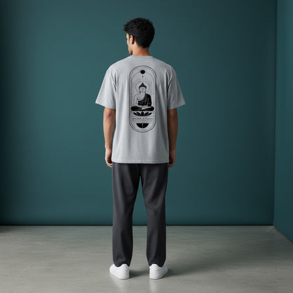 Man wearing a grey Omina heavyweight cotton t-shirt with a black Buddha graphic on the back, relaxed fit.
