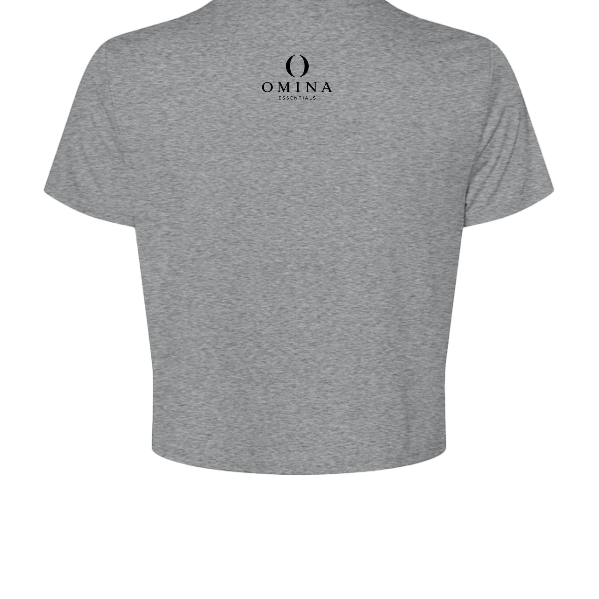 Back view of Omina grey cropped tee featuring a small black Omina Essentials logo at the nape of the neck.