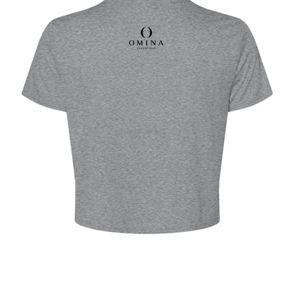 Back view of Omina grey cropped tee featuring a small black Omina Essentials logo at the nape of the neck.
