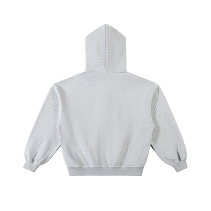 Back view of Omina grey fleece zip hoodie with drop shoulders and contrast stitching in a boxy, loose fit.
