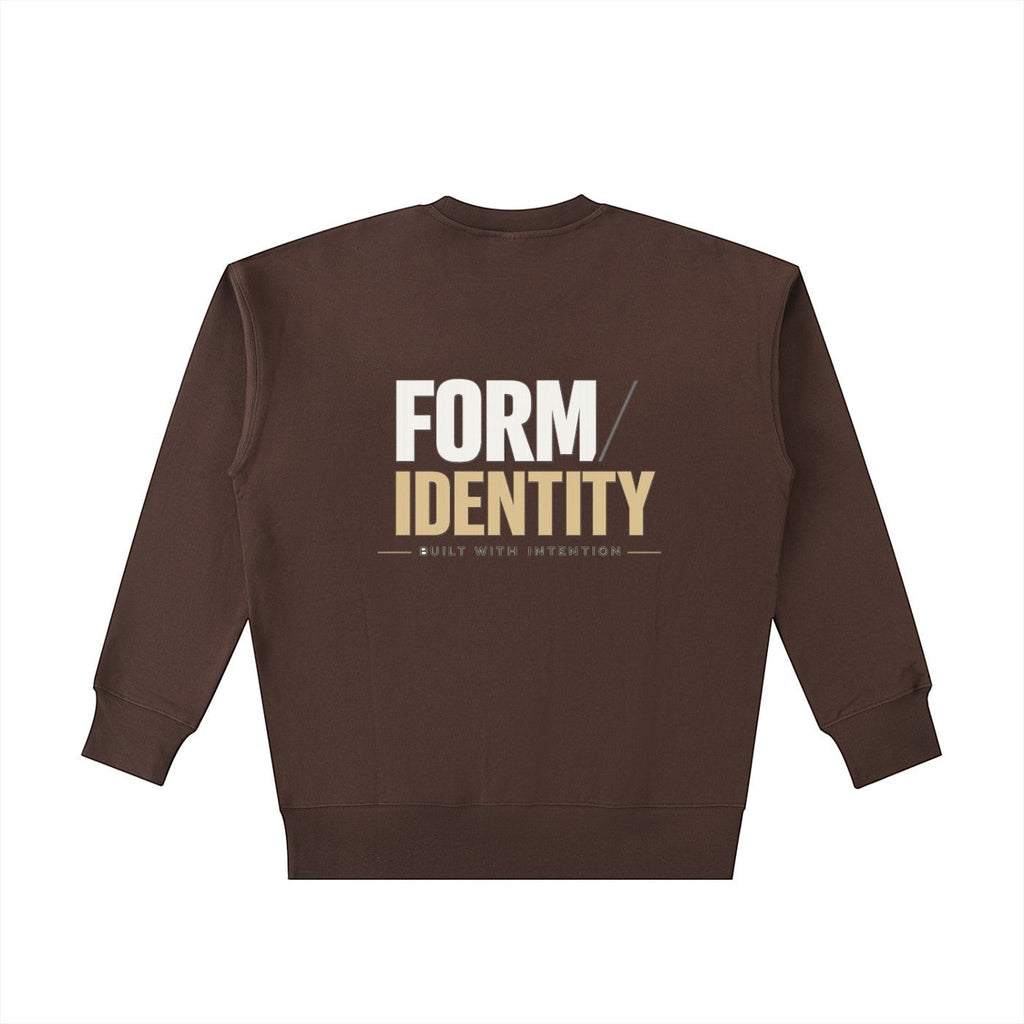 OMINA Studio brown heavyweight cotton sweatshirt with "FORM / IDENTITY - BUILT WITH INTENTION" graphic on back.