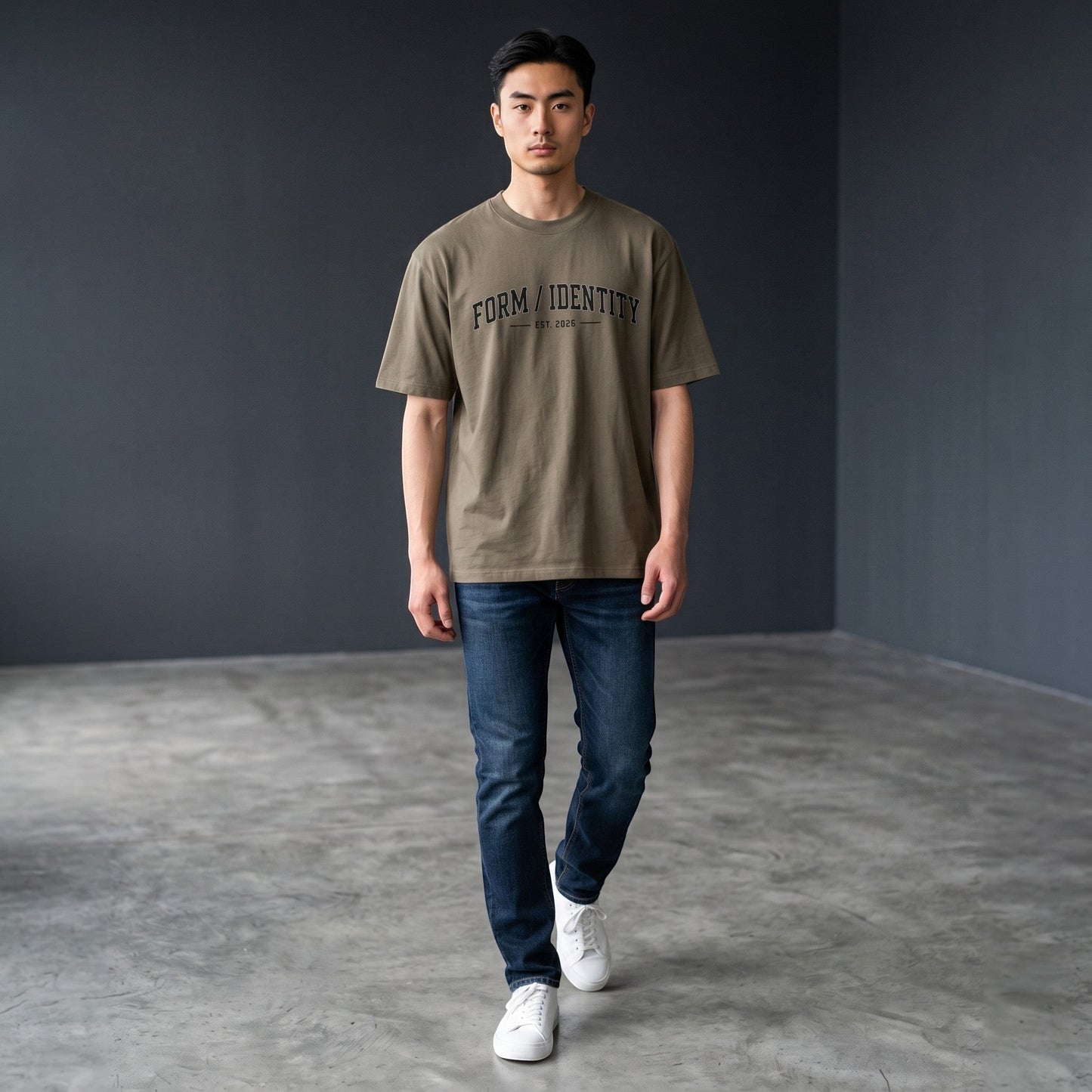Omina Studio heavyweight cotton t-shirt in taupe with "FORM / IDENTITY EST. 2026" graphic on chest.