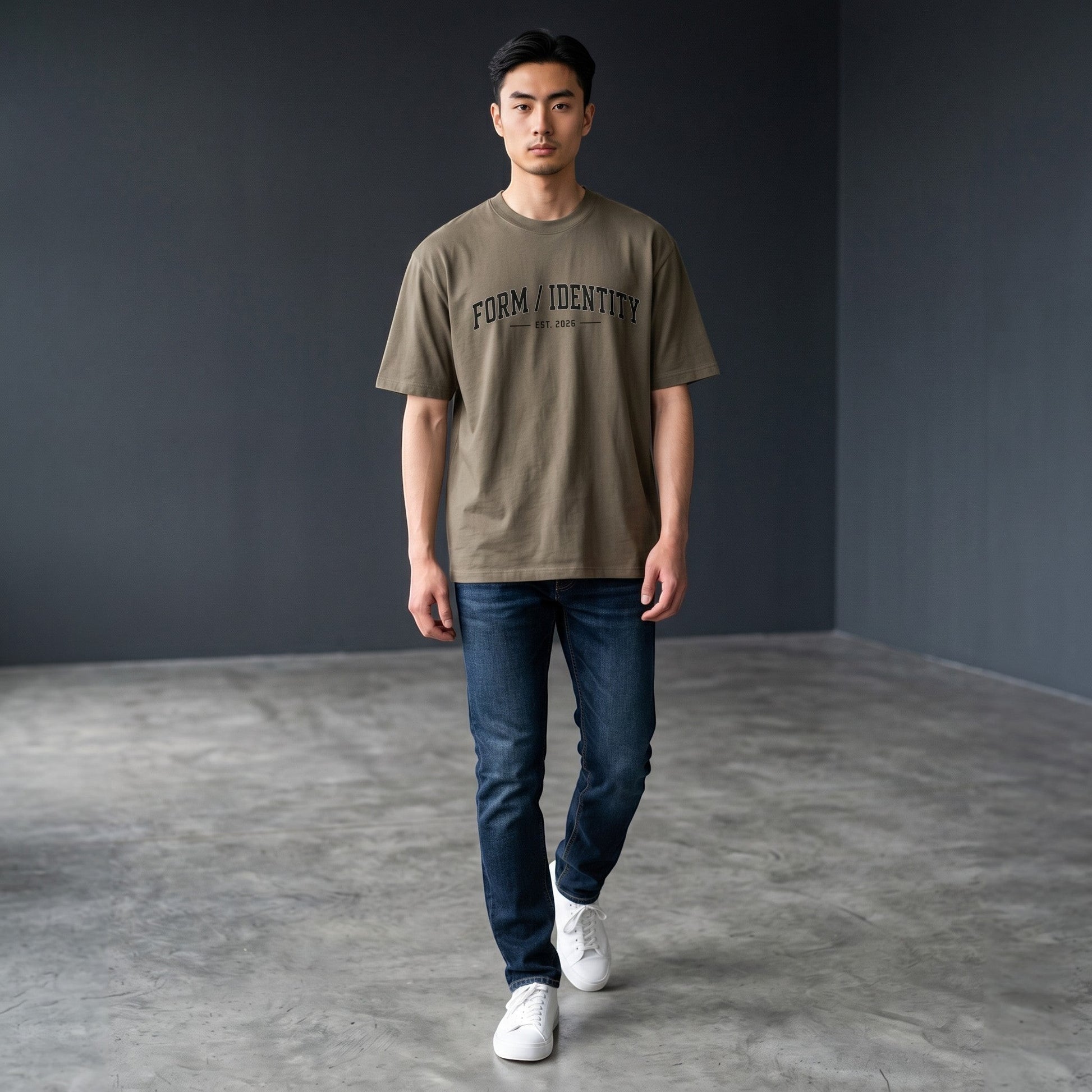 Omina Studio heavyweight cotton t-shirt in taupe with "FORM / IDENTITY EST. 2026" graphic on chest.